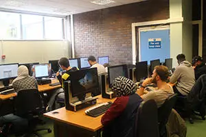 Students in a computer room. 