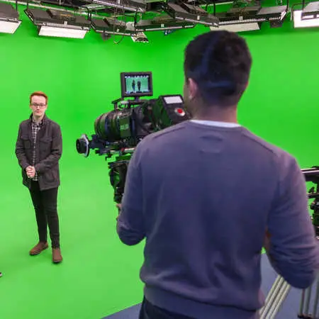 digital media students filming in green room