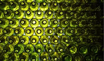 image of 2000 green bottles (per m2,) insulating a wall
