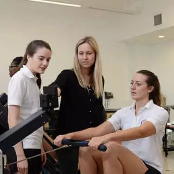 female-students-practicing-rowing-at-physiotherapy-gym-at-brunel-university-london