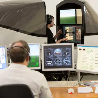 aerospace student testing flight simulator