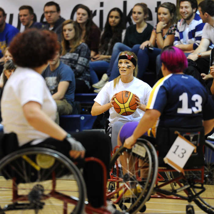 students playing wheelchair basketball