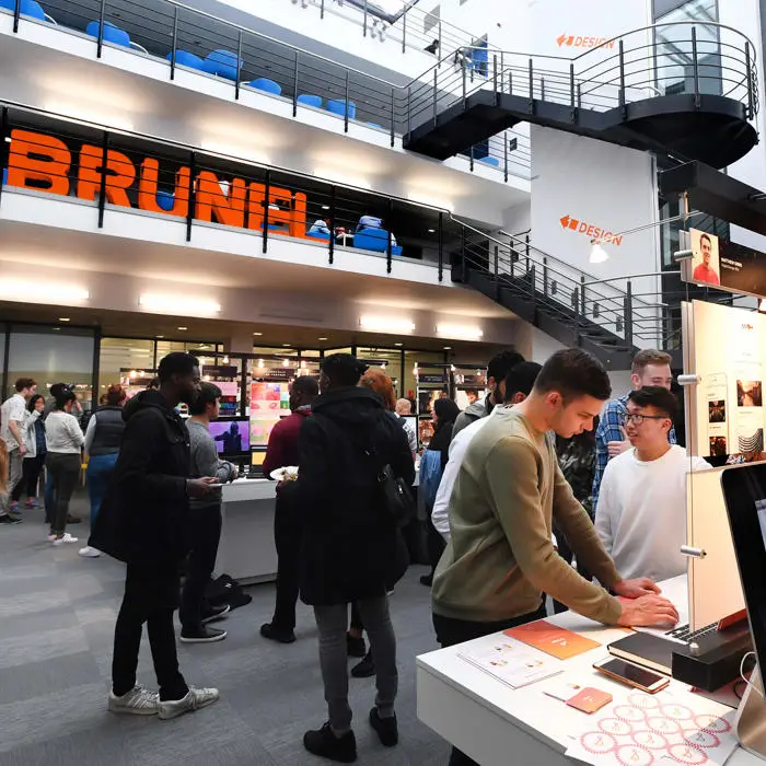 Students talking in Brunel Design School