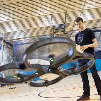 Computer Science Student flying a drone