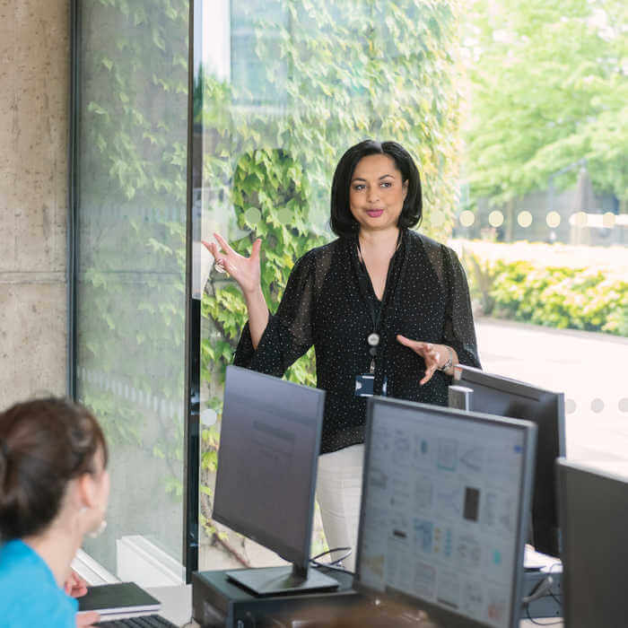 lecturer and students in a computer lab