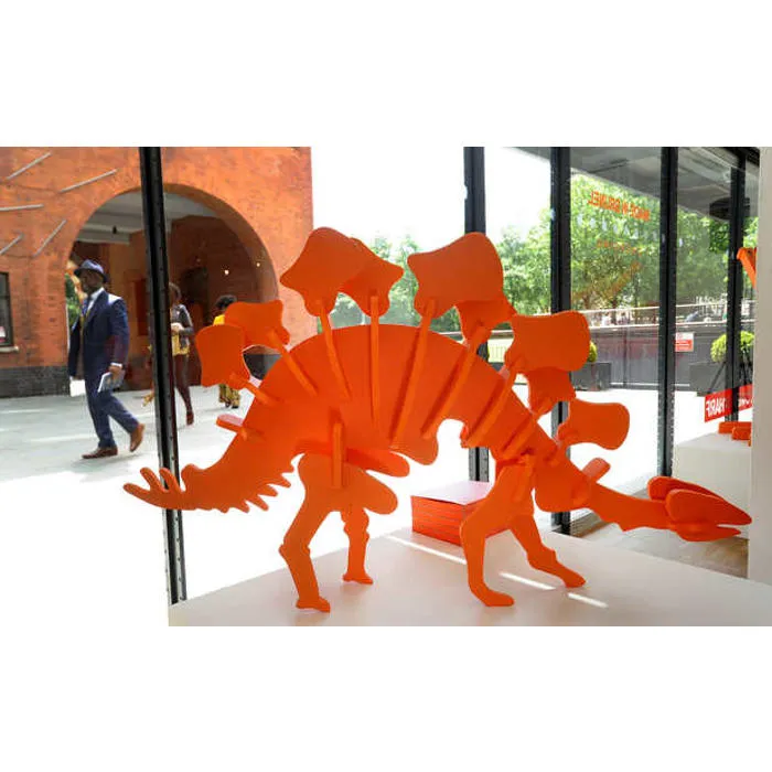 Model of orange dinosaur designed by Made in Brunel design students