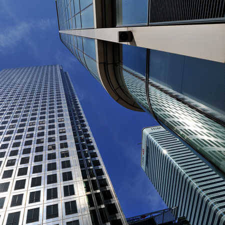 Photo looking up at skyscrapers situated in the economic and financial capital of the UK London