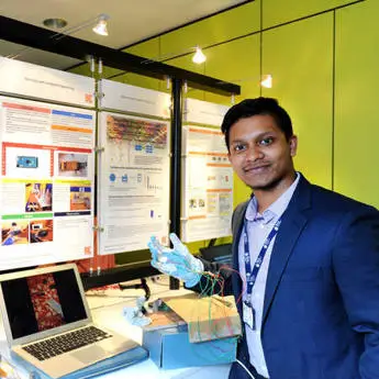 electronic and electrical engineering student presenting project at Brunel Engineers show