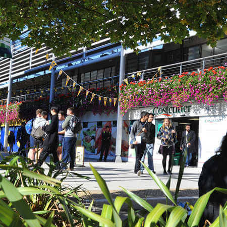 Economics and Finance students walk through the campus concourse area