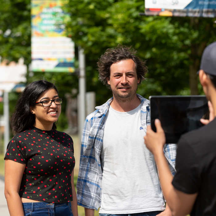 film students recording other students with tablet