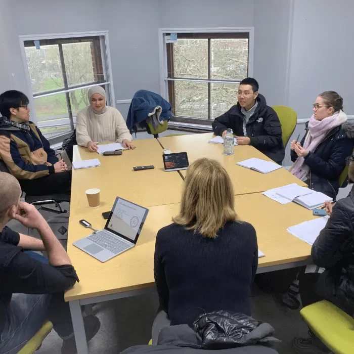 Geography-students-sat-around-table-box