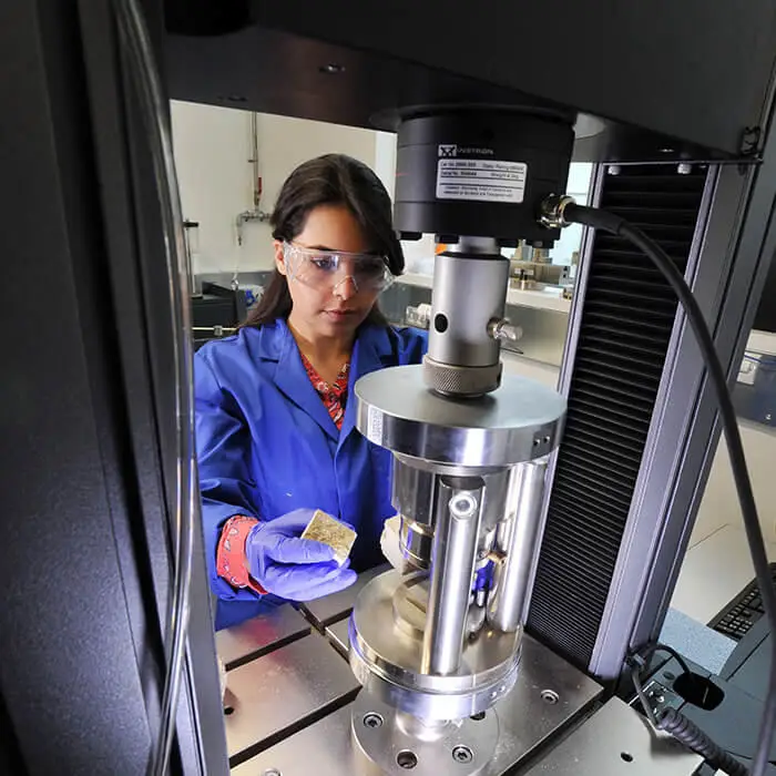 Female student conducting research in lab
