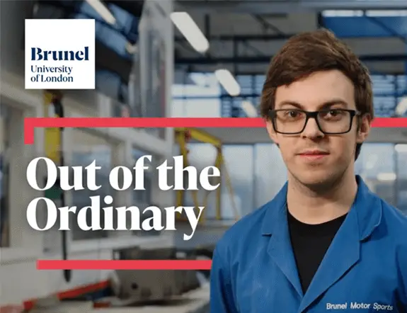 Young man in blue lab coat and glasses stands in workshop with "Out of the Ordinary" text
