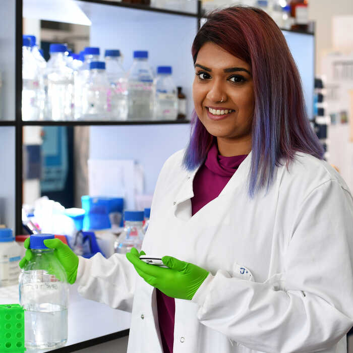 Brunel postgraduate researcher working in a laboratory