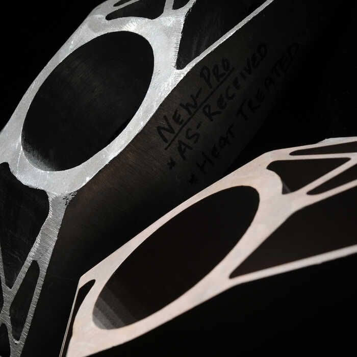 Close-up of an engine component on a black background