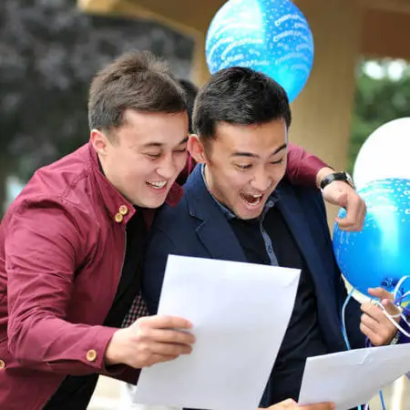 two international students celebration after receiving IPLC award