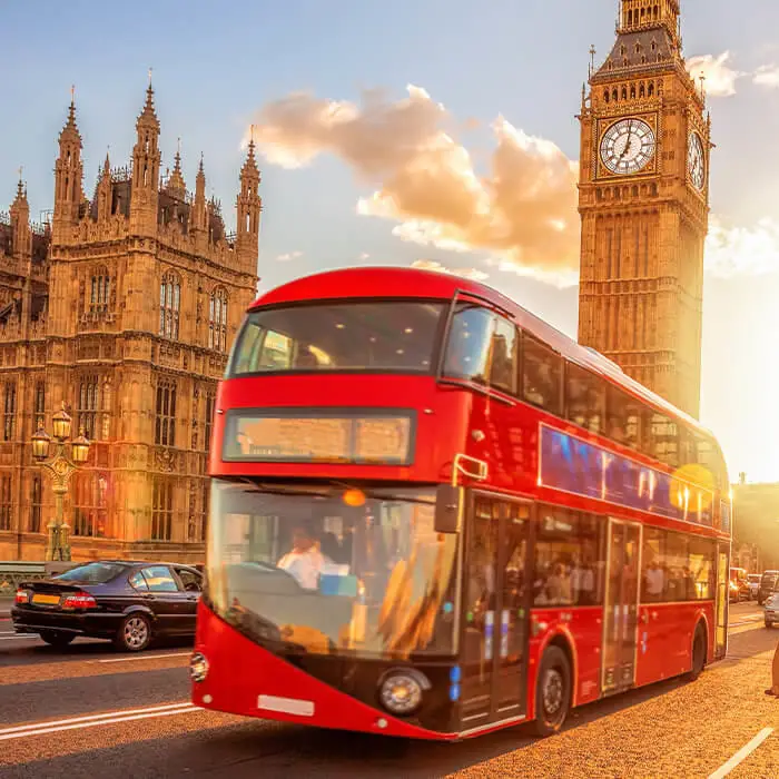 red London TfL bus with Houses of Parliament and Big Ben in the background
