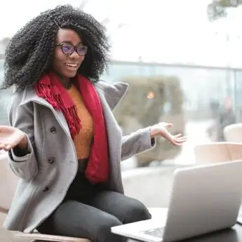 cheerful-surprised-woman-sitting-with-laptop-3762940 andrea picquadio