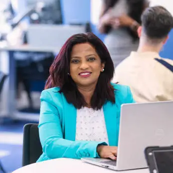 woman working on a laptop