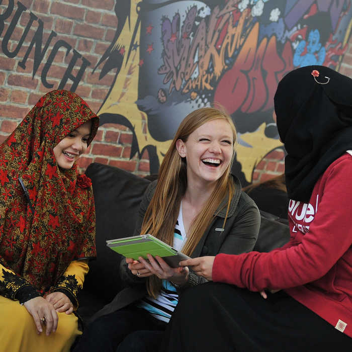 comms erasmus - students talking and laughing