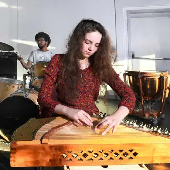 2 students playing instruments