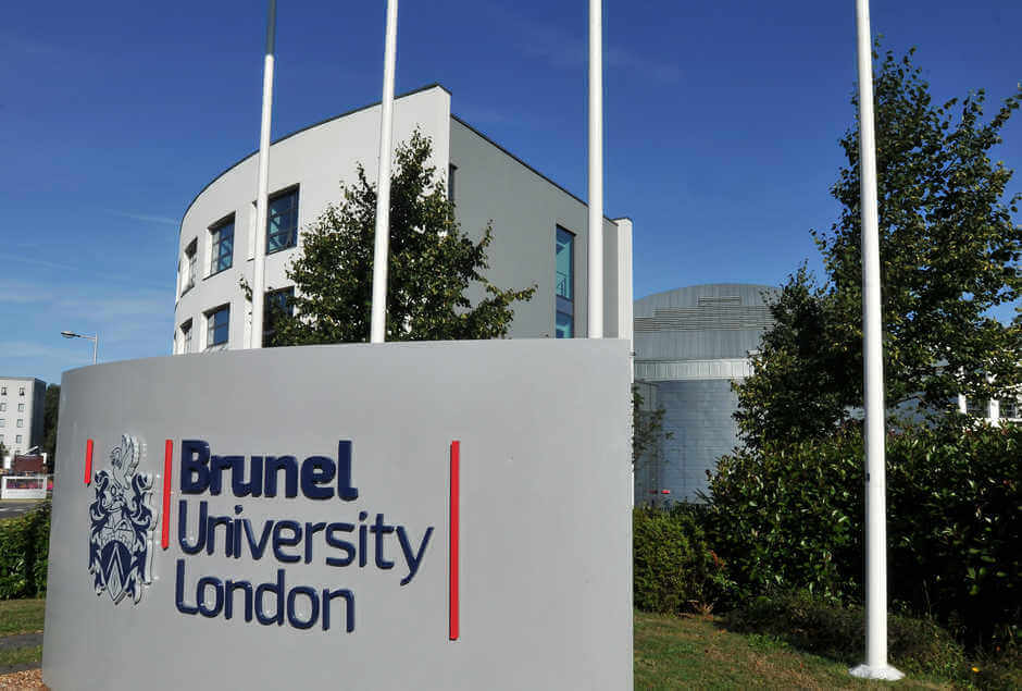 Brunel University London entrance sign and flags