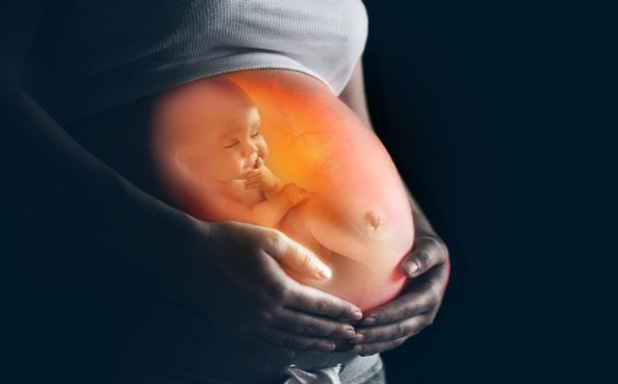 pregnant woman with baby