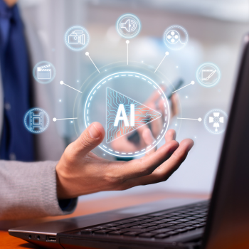 A close-up of a hand holding a glowing AI symbol with filmmaking icons around