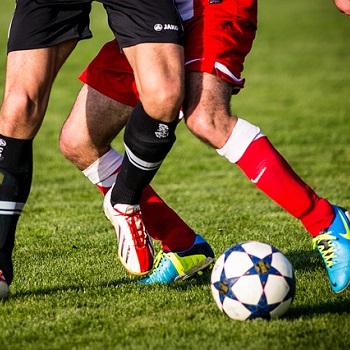 football players and ball