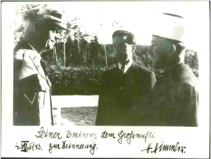 Left to right: Heinrich Himmler, head of the SS, with unknown and Amin al-Husseini, 4 July 1943. Credit – Israeli State Archives, Eichmann Papers. A/3149/16.