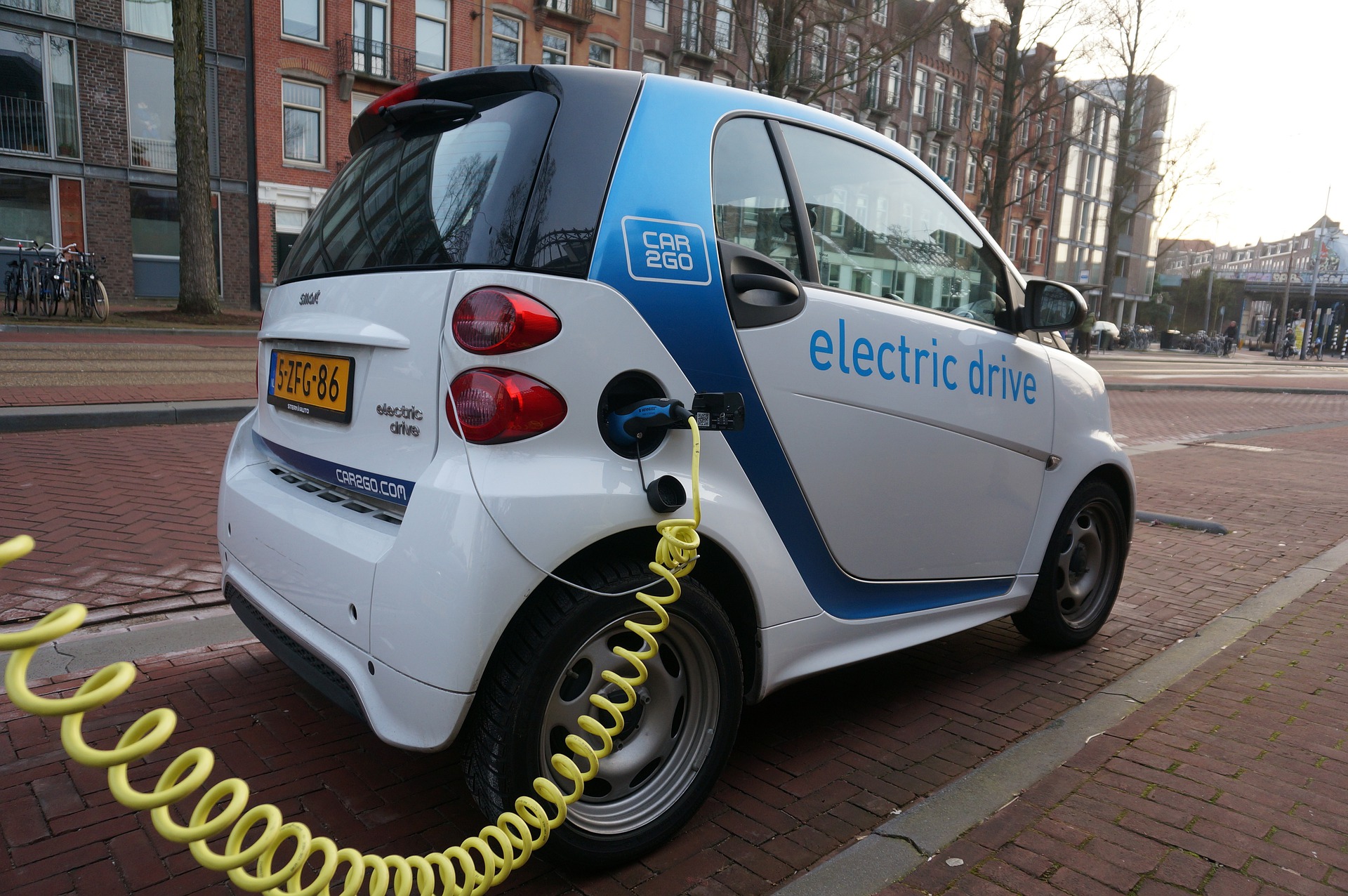 electric car charging by the road