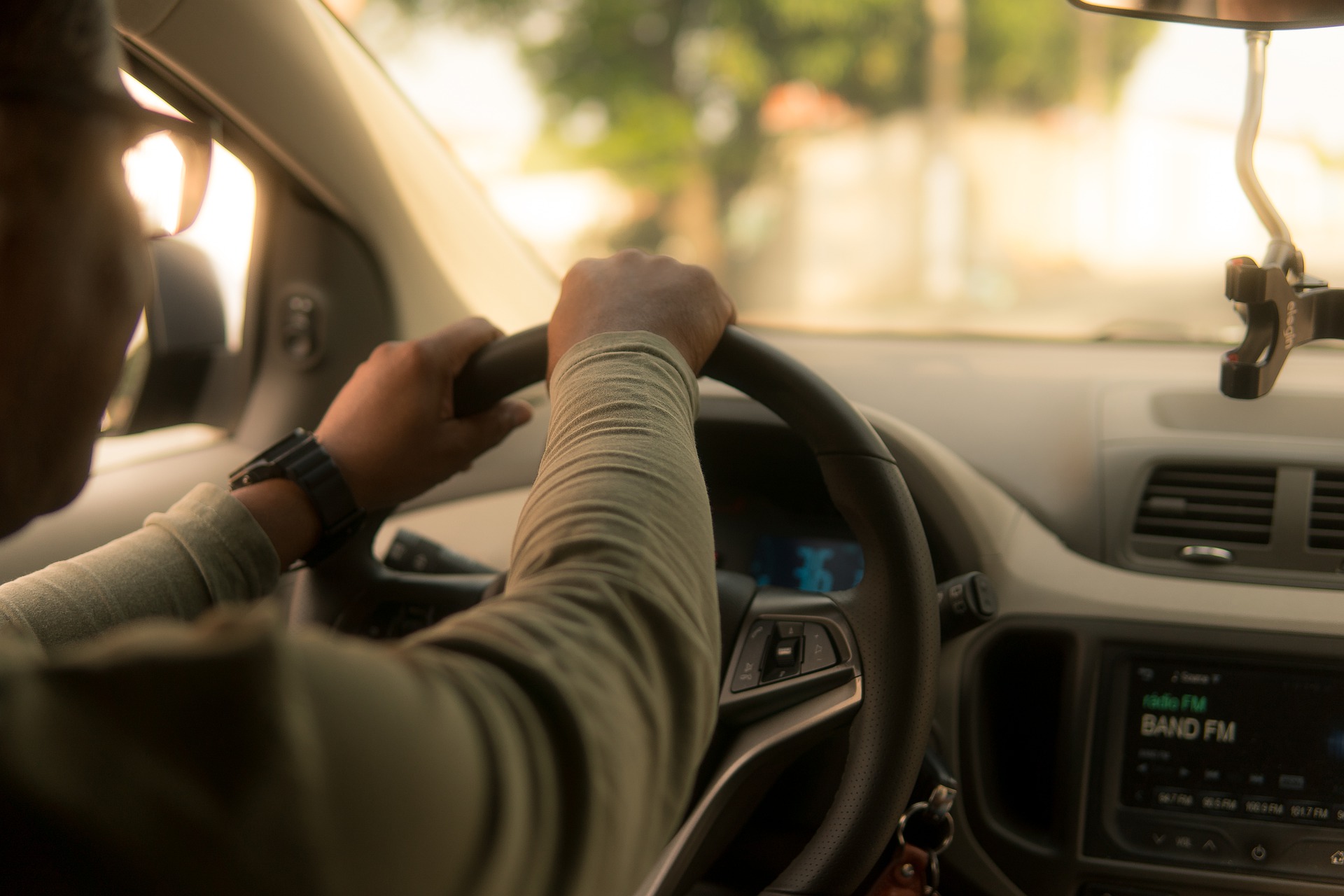 A person holding Staring wheel