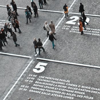 people walking across the street