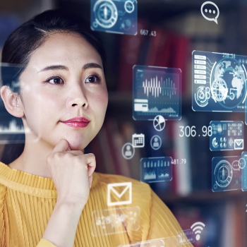 Asian woman looking at computer screen