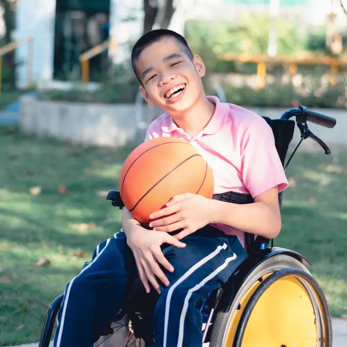 image of kid in wheelchair