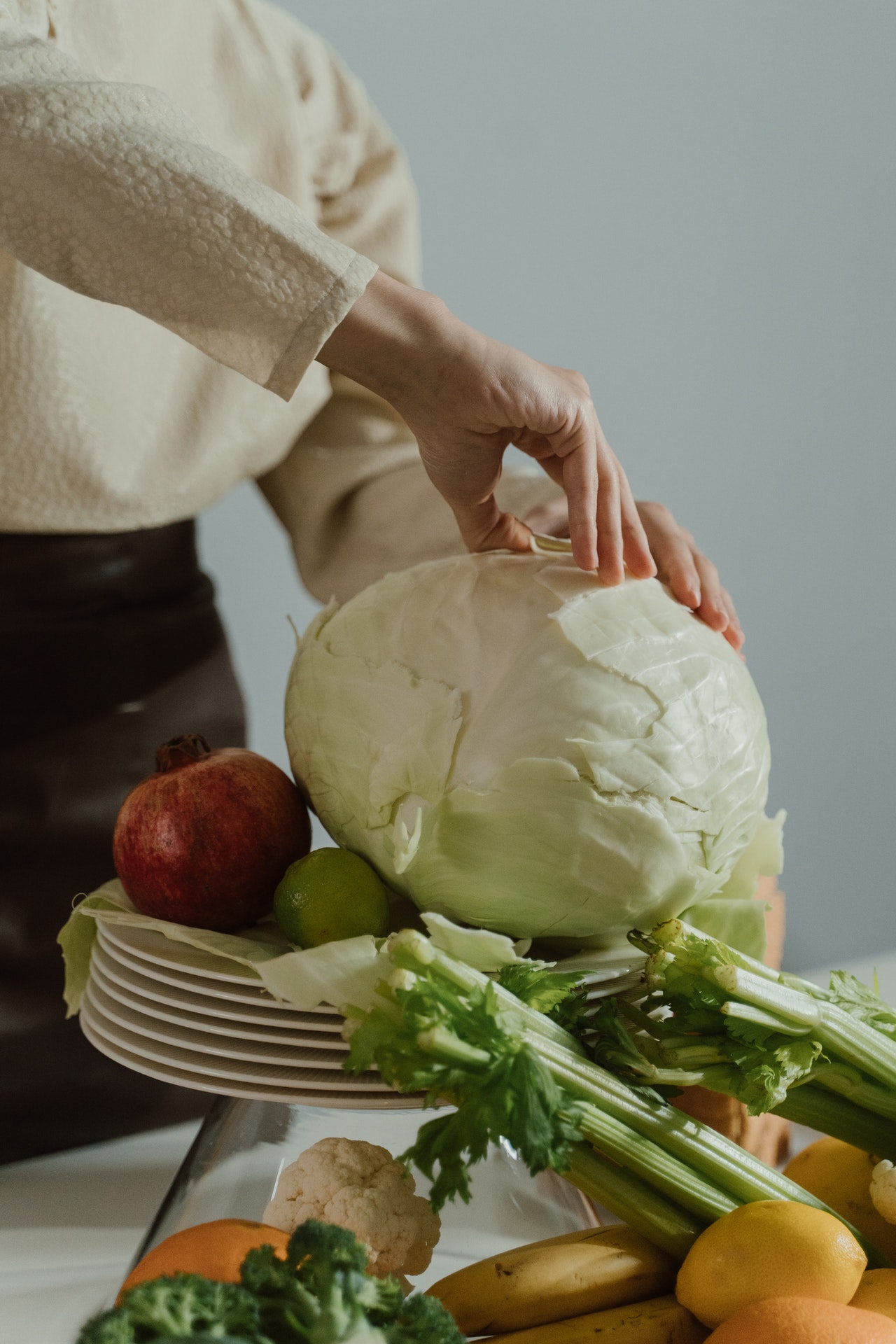 woman peeling vegetables