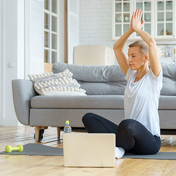 Home exercise with laptop