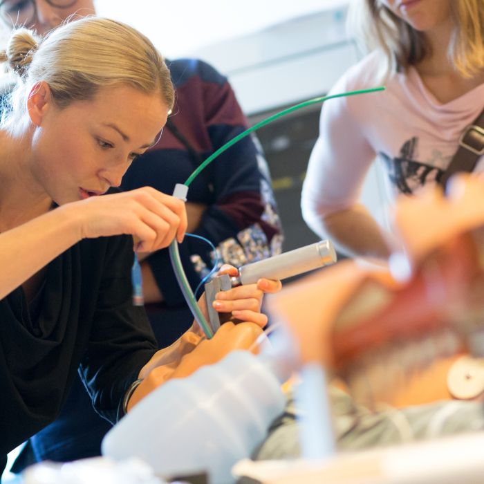 doctor showing intubation