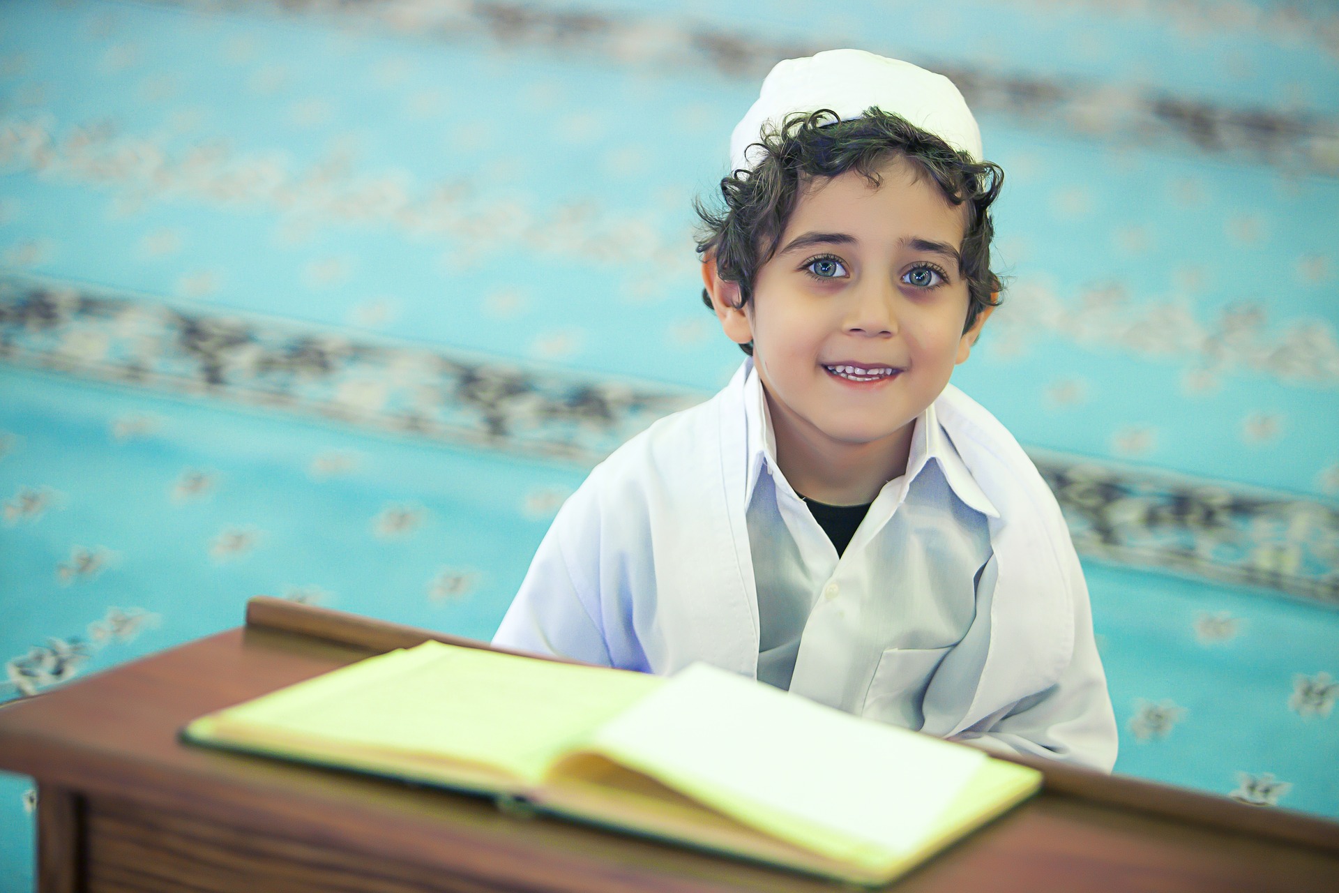 Muslim boy sitting