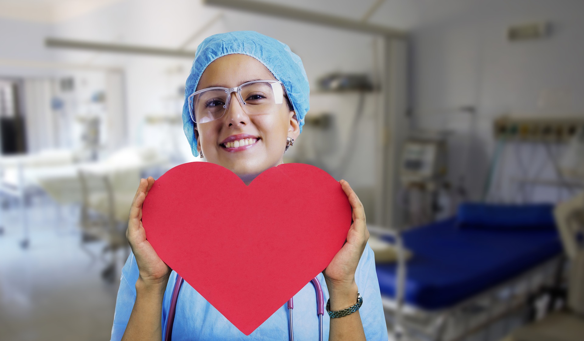 nurse holding a heart