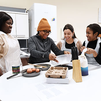 Brunel Occupational Therapy students during a cooking lesson