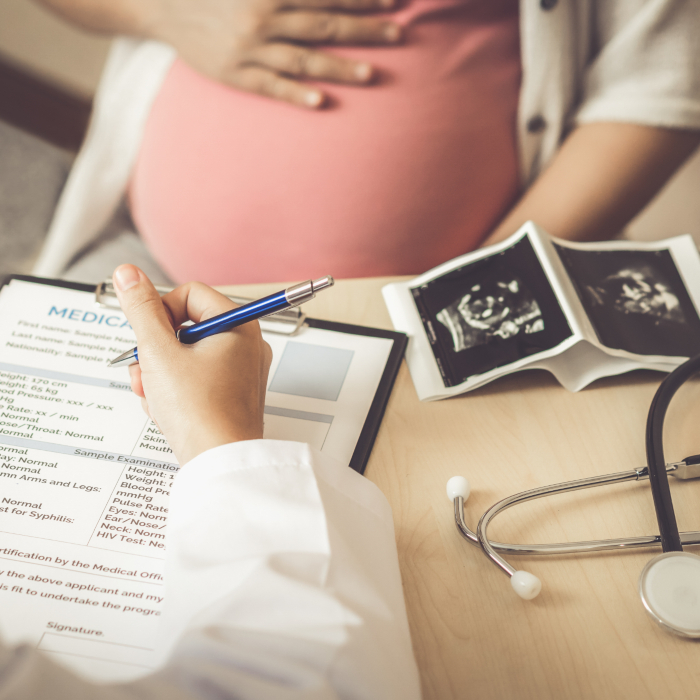 pregnant woman at doctors