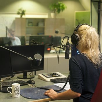 woman presenter in a radio station