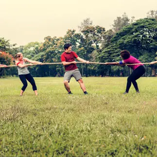 adults playing rope game