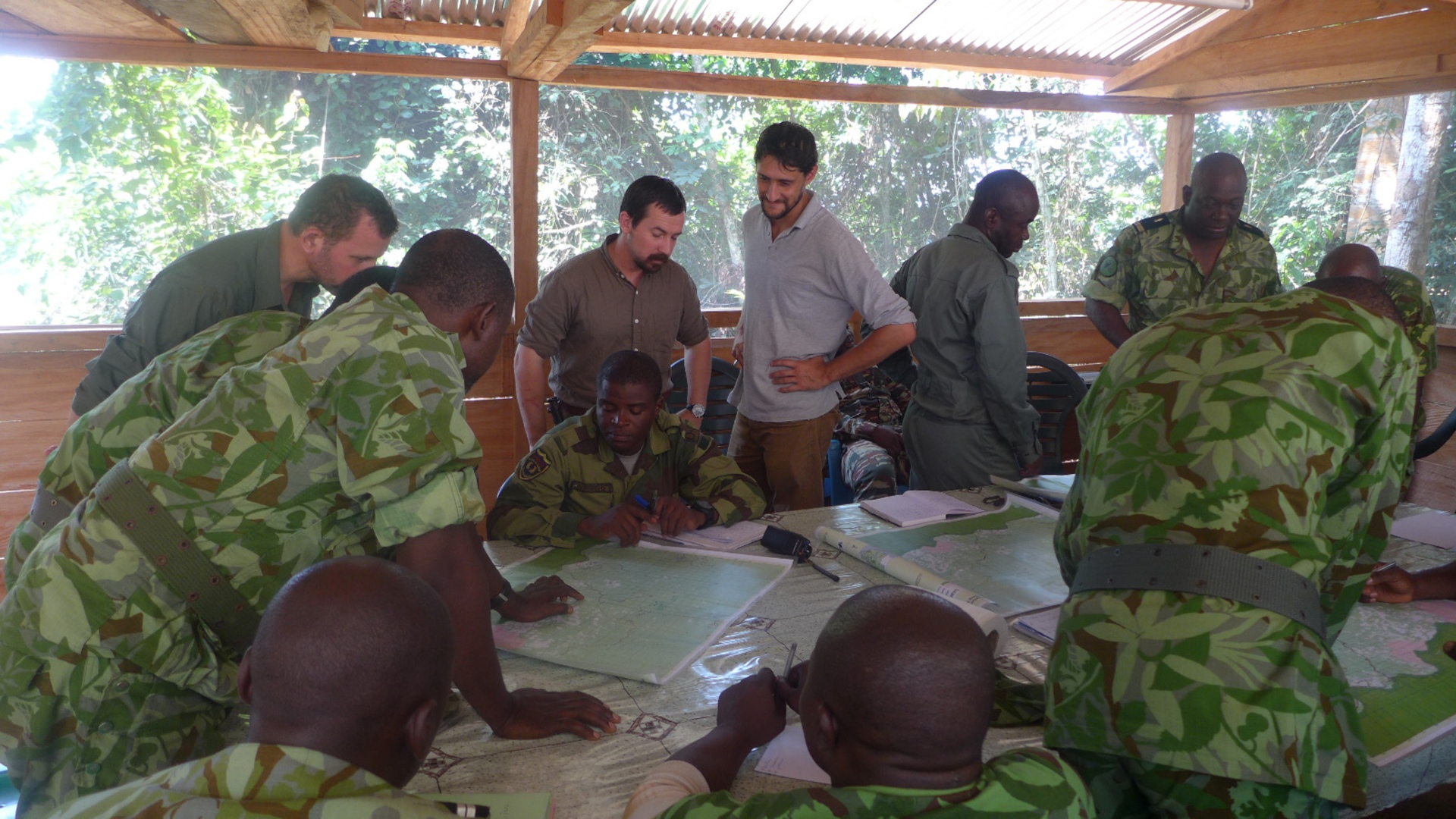 Research team member Luke Townsend doing intelligence training with local rangers.