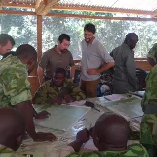 Research team member Luke Townsend doing intelligence training with local rangers.