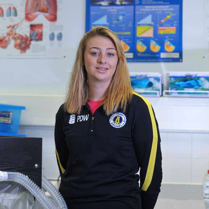 portrait of student in a Sport Health and Exercise Sciences laboratory 3