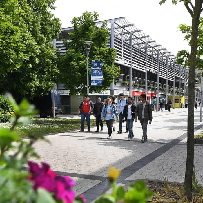 Students walking past the Hamilton building