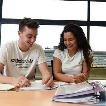 Students studying together in the library