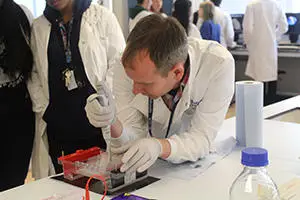 Lecturer showing how to add DNA to a gel for Life Sciences BSc students at Brunel University London.  